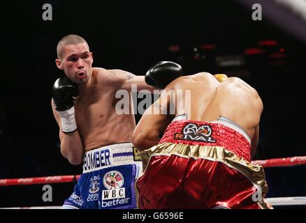 Tony Bellew (left) in action with Isaac Chilemba during their WBC Silver Light Heavyweight Championship and World Final Eliminator at the O2 Arena, London. Stock Photo