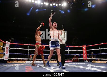 Tony Bellew celebrates defeating Isaac Chilemba during their WBC Silver Light Heavyweight Championship and World Final Eliminator at the O2 Arena, London. Stock Photo