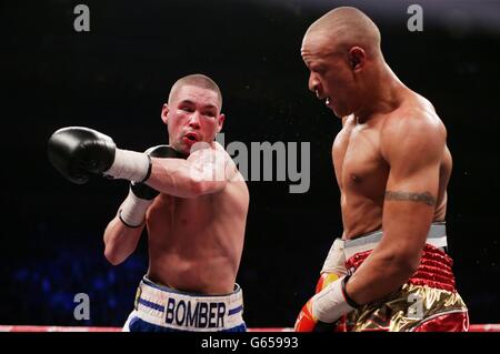 Tony Bellew (left) in action with Isaac Chilemba during their WBC Silver Light Heavyweight Championship and World Final Eliminator at the O2 Arena, London. Stock Photo