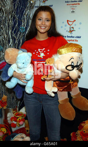 Australian singer Holly Valance with toys during a photocall in aid of Capital FM's 'Help a London Child' at Capital Radio in Leicester Square. Help a London Child is a charity Christmas appeal to give presents to disadvantaged children. Stock Photo