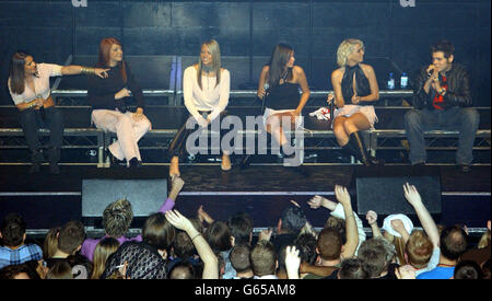 Popstars: The Rivals winners, Girls Aloud, from left to right; Cheryl, Nicola, Kimberley, Nadine and Sarah with Westlife's Bryan McFadden before performing in public for the first time on stage during G.A.Y at the Astoria in London. Stock Photo