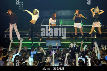 Popstars: The Rivals winners, Girls Aloud, from left to right; Nicola, Kimberley, Cheryl, Nadine and Sarah perform in public for the first time on stage during G.A.Y at the Astoria in London. Stock Photo