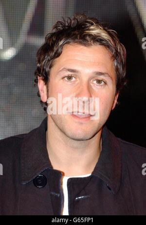 Grant Nicholas, lead singer of the band Feeder performing a live set at the HMV store in London's Oxford Street. Stock Photo