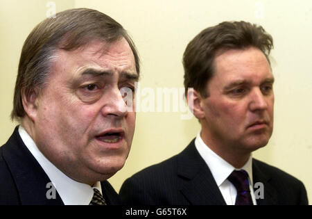 Deputy Prime Minister John Prescott speaks with journalists as Health Secretary Alan Milburn listens, at St. Thomas' Hospital in Central London. * Mr Prescott and Alan Milburn, were at the hospital to help launch the National Service framework for diabetics, encouraging diabetics to under go regular check ups to detect any problems sufferers may have with their eyesight. Stock Photo