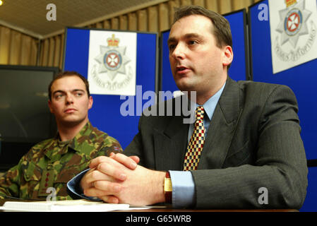 Wiltshire Police Detective Sergeant Andy Cross and Capt Mark Moutarde of the 1st Battalion Queen's Lancashire Regiment hold a press conference in Salisbury. * A soldier was fighting for his life in hospital after he was assaulted with a pick axe during a training exercise on Salisbury Plain, police said. Lance Corporal Konrad Bisping, 26, from the 1st Battalion of the Queen's Lancashire Regiment, based at Catterick, North Yorkshire, underwent emergency surgery to remove the pick axe after it was embedded into his head during the attack late yesterday (Tuesday) afternoon. Detective Sergeant Stock Photo