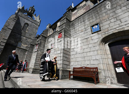 The Duchess of Cornwall in her new role as Chancellor with Principle Ian Diamond as they enter the quadrant on their way to the King's College Chapel during a ceremony at the Aberdeen University. Stock Photo