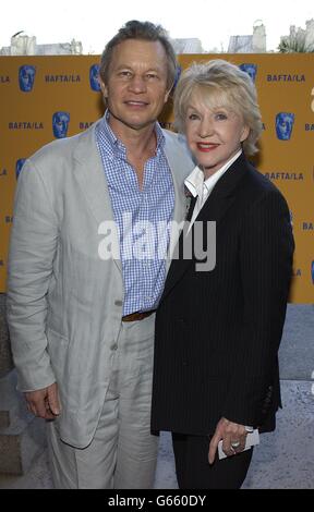 Actor Michael York and wife Pat attend the British Academy of Film and Television (BAFTA) LA Tea Party honoring nominees for the Golden Globe Awards in Los Angeles, California. Stock Photo