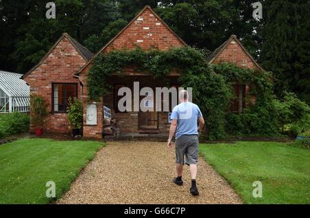 A member of the public walks towards a polling station being used in the EU referendum in a guest house annex in Dogmersfield, Hampshire. Stock Photo