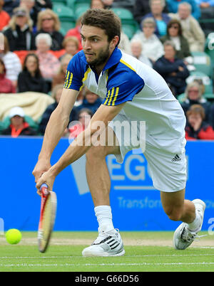 France's Gilles Simon in action against Italy's Andreas Seppi during the AEGON International at Devonshire Park, Eastbourne. Stock Photo