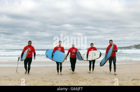 British &amp; Irish Lions (left to right) Toby Faletau, Conor Murray, Rory Best, Justin Tipuric and Alex Cuthbert pose for a picture before surfing on Bondi Beach, Sydney in Australia. Stock Photo