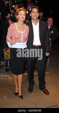 Actor Dougray Scott and his wife Sarah Travis arriving at The Dorchester Hotel in London for the Empire Film Awards. Stock Photo