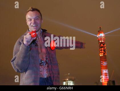 Comedian Graham Norton during a photocall in London where he turned the BT Tower bright red, to officially launch Comic Relief's 2003 campaign for Red Nose Day (14 March). Stock Photo