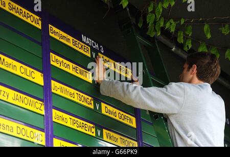 Tennis - 2013 Wimbledon Championships - Day One - The All England Lawn Tennis and Croquet Club. The order of play is arranged during day one of the Wimbledon Championships at The All England Lawn Tennis and Croquet Club, Wimbledon. Stock Photo