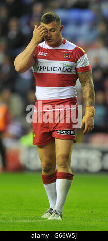 Wigan Warriors' Sam Powell stands dejected at the final whistle during the Super League match at the DW Stadium, Wigan. Stock Photo