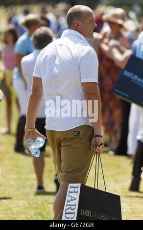 Zara Phillips' husband, Mike Tindall, is left to carry the baggage after his wife competed in a charity polo match at the Tidworth Polo Club near Salisbury. Stock Photo