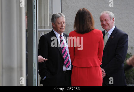 Northern Ireland First Minister Peter Robinson (left) and Deputy First Minister Martin McGuinness (right) chat with Northern Ireland Secretary Theresa Villiers at this year's G8 Summit on Lough Erne near Enniskillen in Northern Ireland. Stock Photo