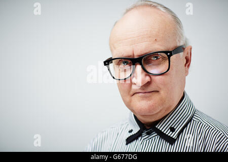 Senior in glasses Stock Photo