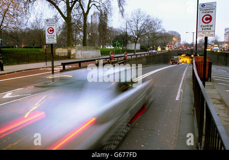 A motorist on its way into central London. From today drivers using an eight mile square zone of the capital between 0700 and 1830 Monday to Friday have to pay a 5 charge. * Their payments are monitored against digitised images recorded by an array of about 700 cameras in and on the periphery of the zone. There are discounts for drivers living within the zone, and money raised from the scheme will go towards improving public transport. 27/08/2003: Commuters are taking risks on the road to spend more time with their loved ones, according to a survey out Wednesday August 27, 2003. Most (66%) Stock Photo