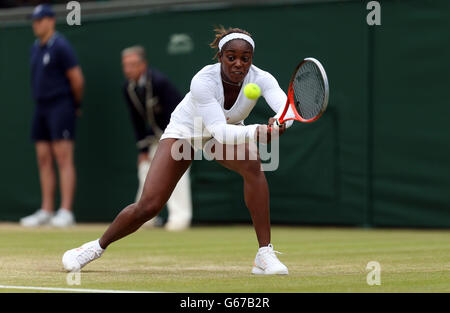 USA's Sloane Stephens in action against France's Marion Bartoli during day eight of the Wimbledon Championships at The All England Lawn Tennis and Croquet Club, Wimbledon. Stock Photo