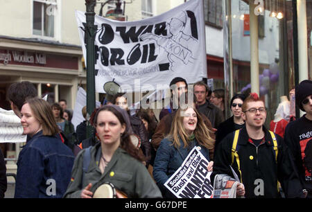 Anti-war protestors gather around Canterbury Cathedral, Kent, at the enthronement of the 104th Archbishop of Canterbury, Dr Rowan Williams. Williams will formally begin his public ministry as leader of 70 million Anglicans at the service at Canterbury Cathedral. *..Guests began to stream into the West Door of the cathedral to the sound of ringing bells. Wearing colourful and varied robes, the religious representatives were greeted by clergy from the cathedral. Stock Photo