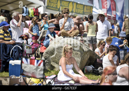 Equestrian fans enjoy the hot sunshine during day four of the Barbury International Horse Trials at Barbury Castle, Wiltshire. Stock Photo