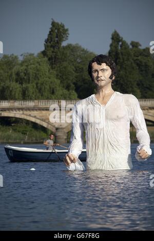 A statue of Jane Austen's romantic hero Mr Darcy in The Serpentine in London's Hyde Park to celebrate the launch of UKTV's new free channel 'Drama'. Stock Photo