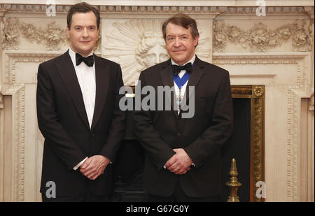 (Left to right) Chancellor of the Exchequer George Osborne and The Lord Mayor of the City of London Roger Gifford attend the 'Lord Mayor's Dinner to the Bankers and Merchants of the City of London' at the Mansion House. Stock Photo