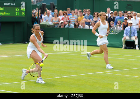 Tennis - 2013 Wimbledon Championships - Day Three - The All England Lawn Tennis and Croquet Club. Italy's Roberta Vinci (left) and Sara Errani during their Ladies' Doubles match against Great Britain's Anne Keothavong and Johanna Konta Stock Photo
