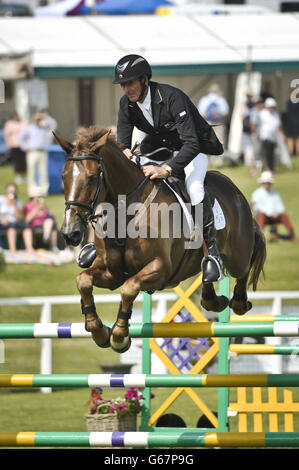 New Zealand's Mark Todd on OLOA takes part in the Showjumping during day three of the Barbury International Horse Trials at Barbury Castle, Wiltshire. Stock Photo