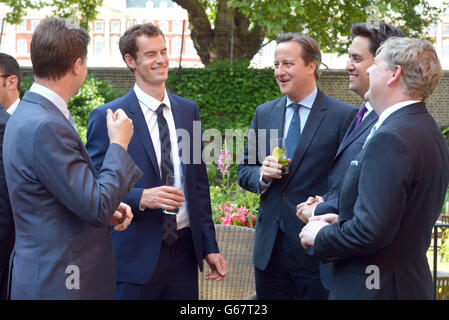 Wimbledon winner Andy Murray joins (from left) Deputy Prime Minister Nick Clegg, Prime Minister David Cameron, labor leader Ed Miliband and SNP Westminster leader Angus Robinson during a cross-party reception in the garden of Downing Street, London l Stock Photo