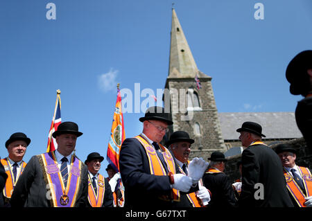 Worshipful District Master of Portadown District Loyal Orange Lodge (LOL) No 1, Cattle Farmer,Husband and father to two children Darryl Hewitt adjusts his white cotton parade gloves outside Drumcree parish church on Sunday morning 7th July after service before parading down to the police barricade during the annual Orange Order parade to Drumcree Parish Church. Stock Photo