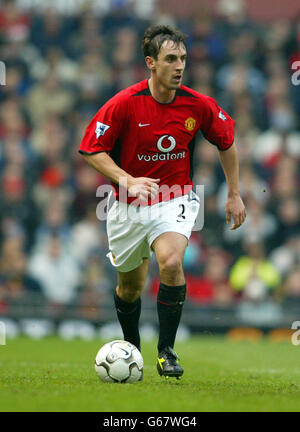 Manchester United's Gary Neville in action against West Ham during their Barclaycard Premiership match at Old Trafford in Manchester. Final score 3-0 to Manchester United. 24/7/04: Gary Neville and Phil Neville (right) who have signed new five-year deals that will effectively see both brothers finish their careers at Manchester United. The club confirmed from their training camp in Chicago they had sealed the players' futures until 2009. Stock Photo