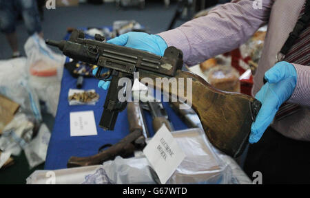 Gardai display arms and explosives, including an Uzi Sub-machine gun recently recovered from dissident republicans in the Dublin area in recent days at Garda Headquarters in Dublin today. Stock Photo