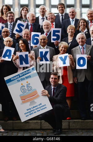 Shadow health secretary Andy Burnham with other Labour MPs at the House of Commons in London today to mark the 65th anniversary of the National Health Service. Stock Photo