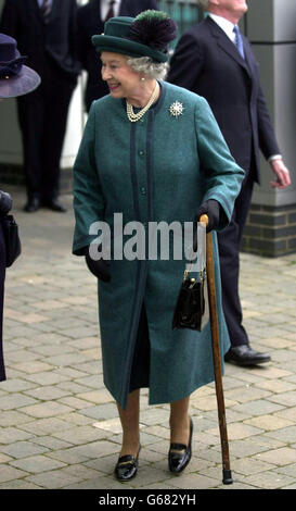 Queen Elizabeth II departing the Halifax Bank of Scotland call centre at Cromac Wood in south Belfast. On the final engagement of their one-day trip to Northern Ireland, the Queen and the Duke of Edinburgh were accompanied around the 45 million waterside building. * which opened in June 2001, by Northern Ireland Secretary Paul Murphy and enterprise minister Ian Pearson. Stock Photo
