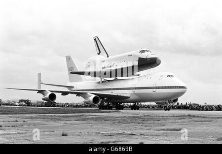 Space Shuttle Orbiter Enterprise, mounted on a modified Boeing 747 shuttle carrier aircraft (SCA) during a brief stop for refuelling at RAF Fairford. The Shuttle is on its way to various display points in Europe, including the Paris Air Show. Stock Photo