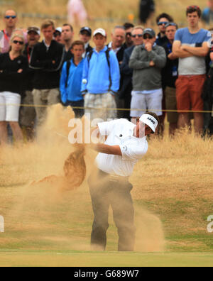 USA's Phil Mickelson plays out of the bunker on the 10th hole during day four of the 2013 Open Championship at Muirfield Golf Club, East Lothian. Stock Photo