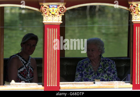 The Countess of Wessex and Queen Elizabeth II are rowed down the river Thames near Windsor in the royal barge the Gloriana. Stock Photo