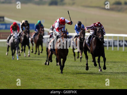 Djet Taouy ridden by Paul Mulrennan (front left) wins the President of The UAE Cup during Abu Dhabi Gentlemen's Day of the Piper-Heidsieck July Festival at Newmarket Racecourse, Newmarket. Stock Photo