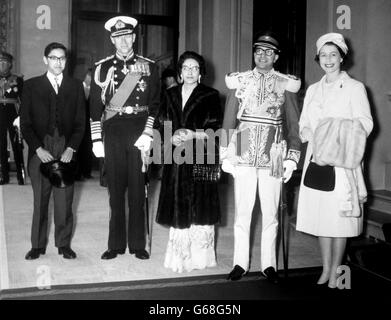 King Mahendra of Nepal and his consort Queen Ratna with crown Prince Birendra (left) and their hosts, Queen Elizabeth II and Prince Philip, the Duke of Edinburgh, at Buckingham Palace. The Nepalese Royal couple arrives in London to day for a state visit. The Crown Prince was given special leave from Eton to meet them at Gatwick Airport and accompany them to the Palace. Stock Photo