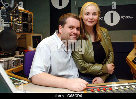 BBC Radio 1 DJ Chris Moyles poses with TV presenter Gail Hipgrave during a photocall at Yalding House in London, prior to his daily radio show. Gail Hipgrave is the third of several special guests standing in for Chris's sidekick Comedy Dave. Stock Photo