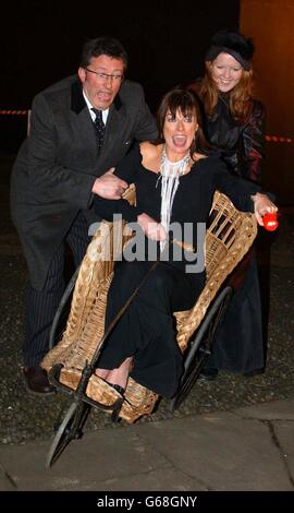 Celebrity student comedienne Doon Mackichan attempts to leave with the help of TV presenter Rowland Rivron after being evicted from the Comic Relief does Fame Academy in north London. Stock Photo