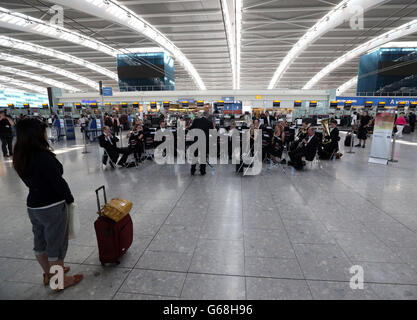 A Special performance by the London Philharmonic Orchestra of music from the hit BBC TV series Doctor Who in Terminal 5 of Heathrow Airport in London as part of a summer promotion with Doctor Who and BBC Worldwide. Stock Photo
