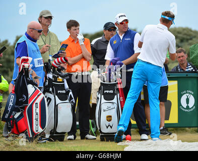 England's Lee Westwood, Ian Poulter and England's Matthew Fitzpatrick on the 4th during practice day three for the 2013 Open Championship at Muirfield Golf Club, East Lothian. Stock Photo