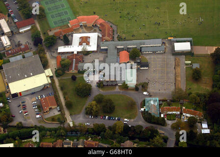 Aerial photograph of Soham Village College showing the home of the caretaker (bottom right), and the school 'Hanger' (top right). Stock Photo