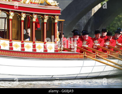 Queen rowed down Thames in Gloriana Stock Photo