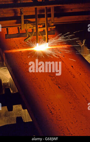 Gas cutting of the hot metal plate Stock Photo