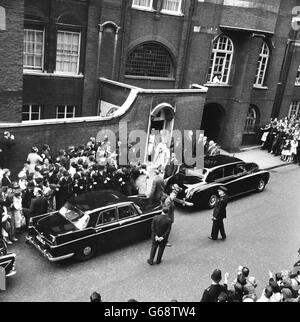 American President John F Kennedy leaves Westminster Cathedral after the christening of Anna Christina Radziwill, with his wife Jacqueline following behind. Anna Christina's mother, Princess Radziwill, is Jacqueline Kennedy's sister. Stock Photo