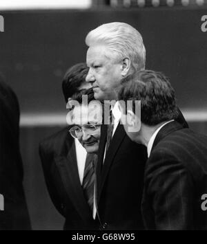 Russian Premier Boris Nikolayevich Yeltsin on a remarkably open unannounced walkabout in the City of London. He was on an unannounced visit to the European Bank for Reconstruction and Development in London, seeking financial help for the Russian economy which was on the verge of collapse at the time, a month after the winding up of the USSR and the introduction of a free market economy. 30 Jan 1992. The President of the the European Bank for Reconstruction and Development, Jaques Attali, is walking on Yeltsin's right. Stock Photo