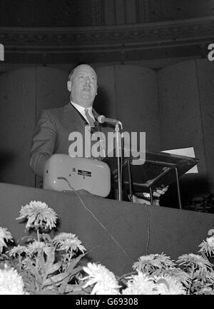 Dr Richard Beeching, Chairman of the British Transport Commission, speaking about his plan for the Railways while addressing the annual conference of the Institute of Directors at the Royal Albert Hall, London. Stock Photo